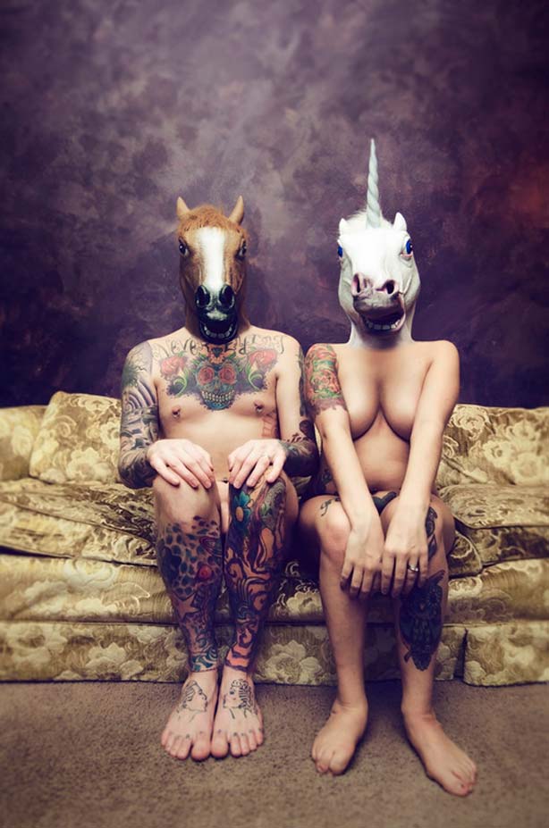 horse-and-unicorn-mask-heads-on-couple